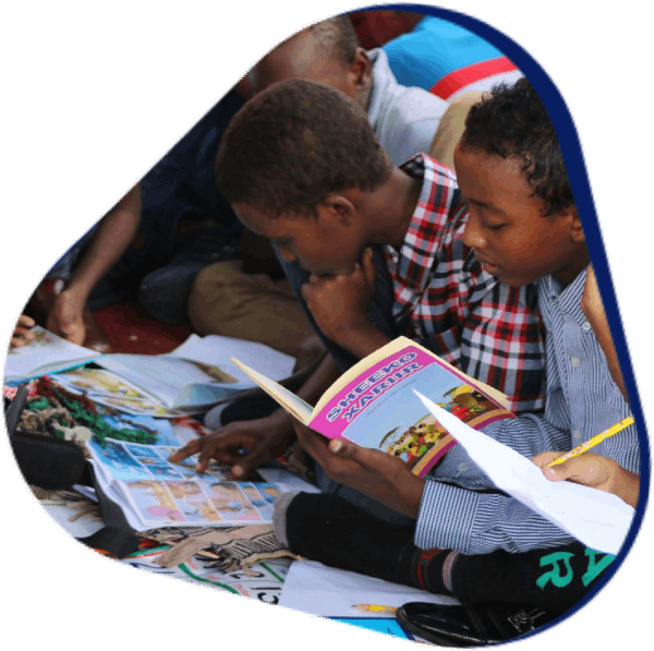 Children reading educational materials