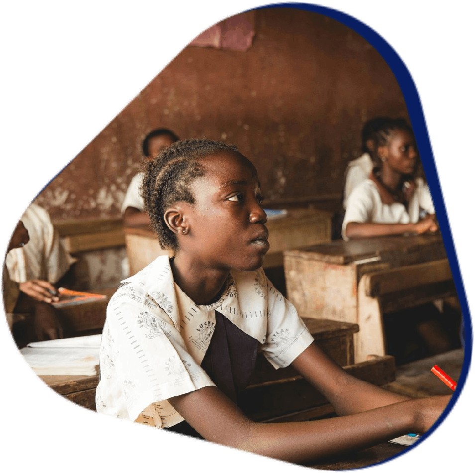 Students attentively listening in class