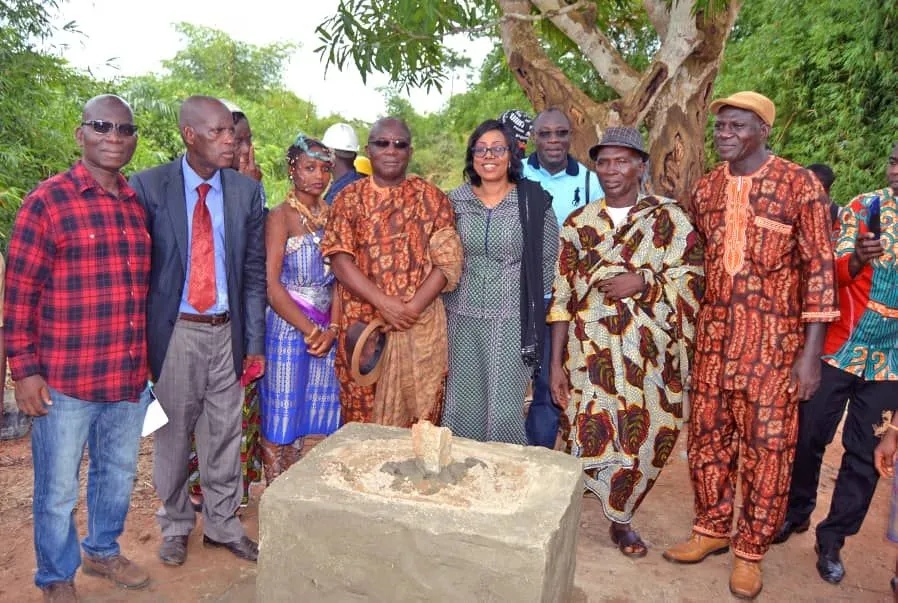 Group gathering near a monument